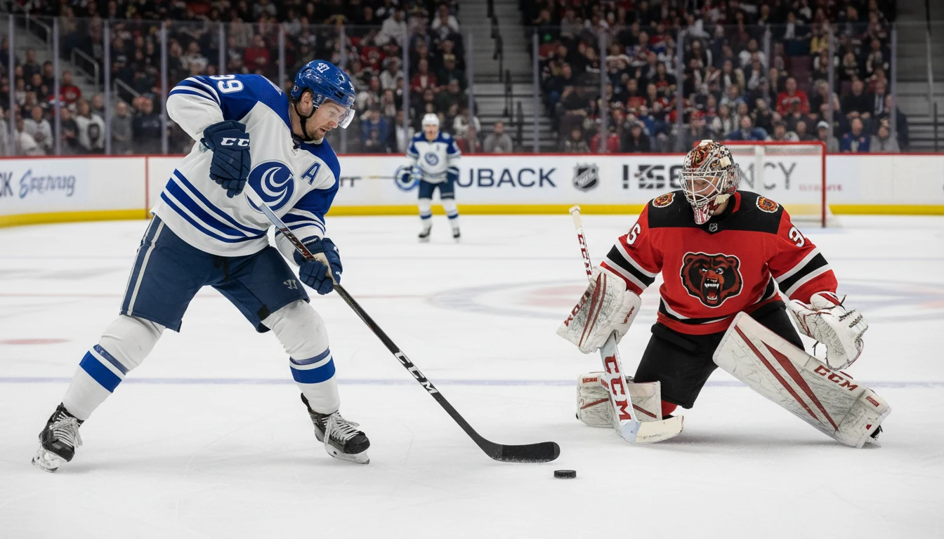 NHL forward taking a shot on goal with goaltender in position